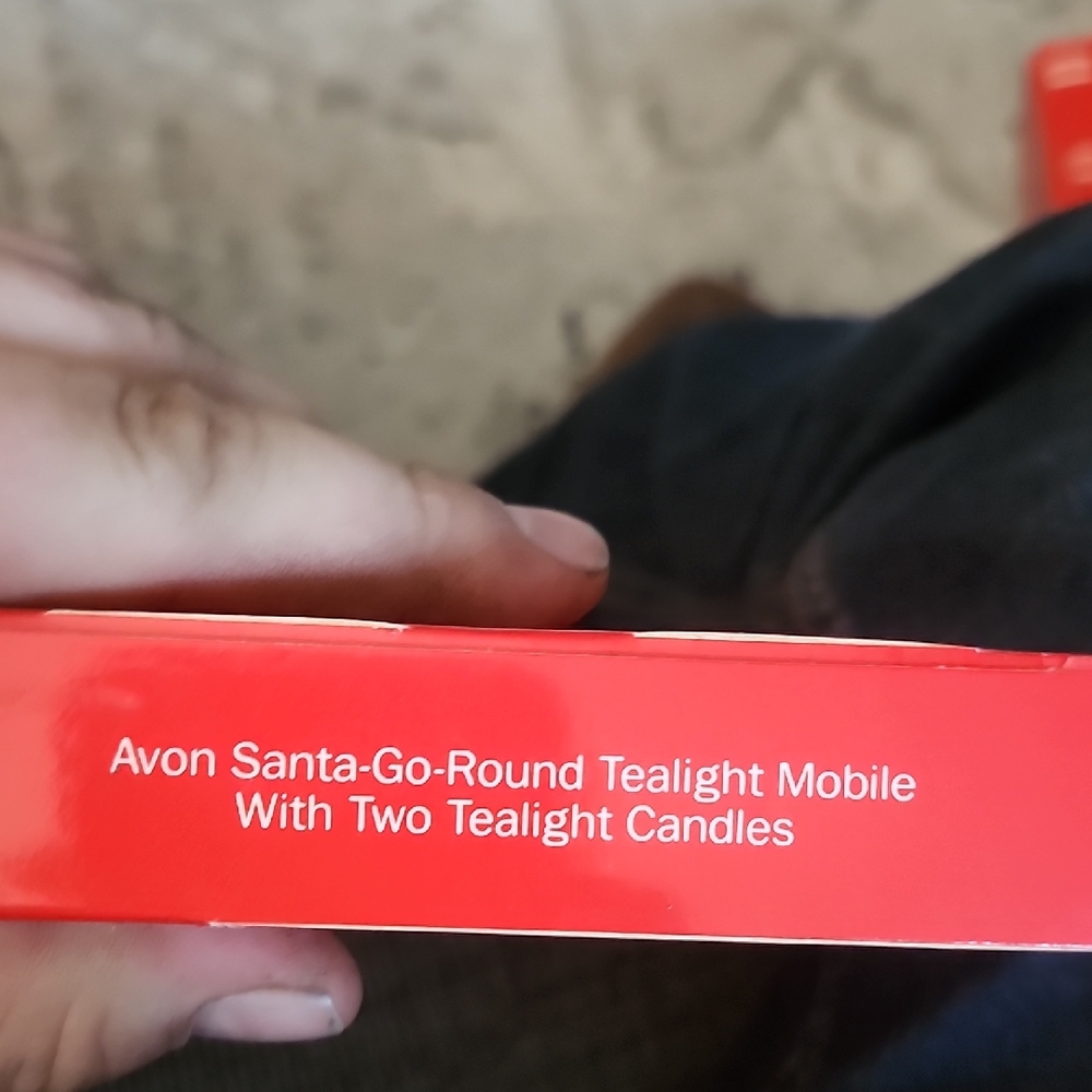 Avon Santa-Go-Round Tealight Mobile with Red Packaging